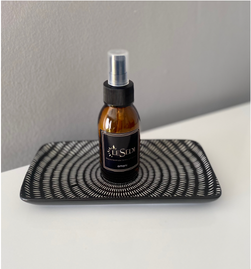 Amber Fragrances Linen & Room Mist bottle with elegant design